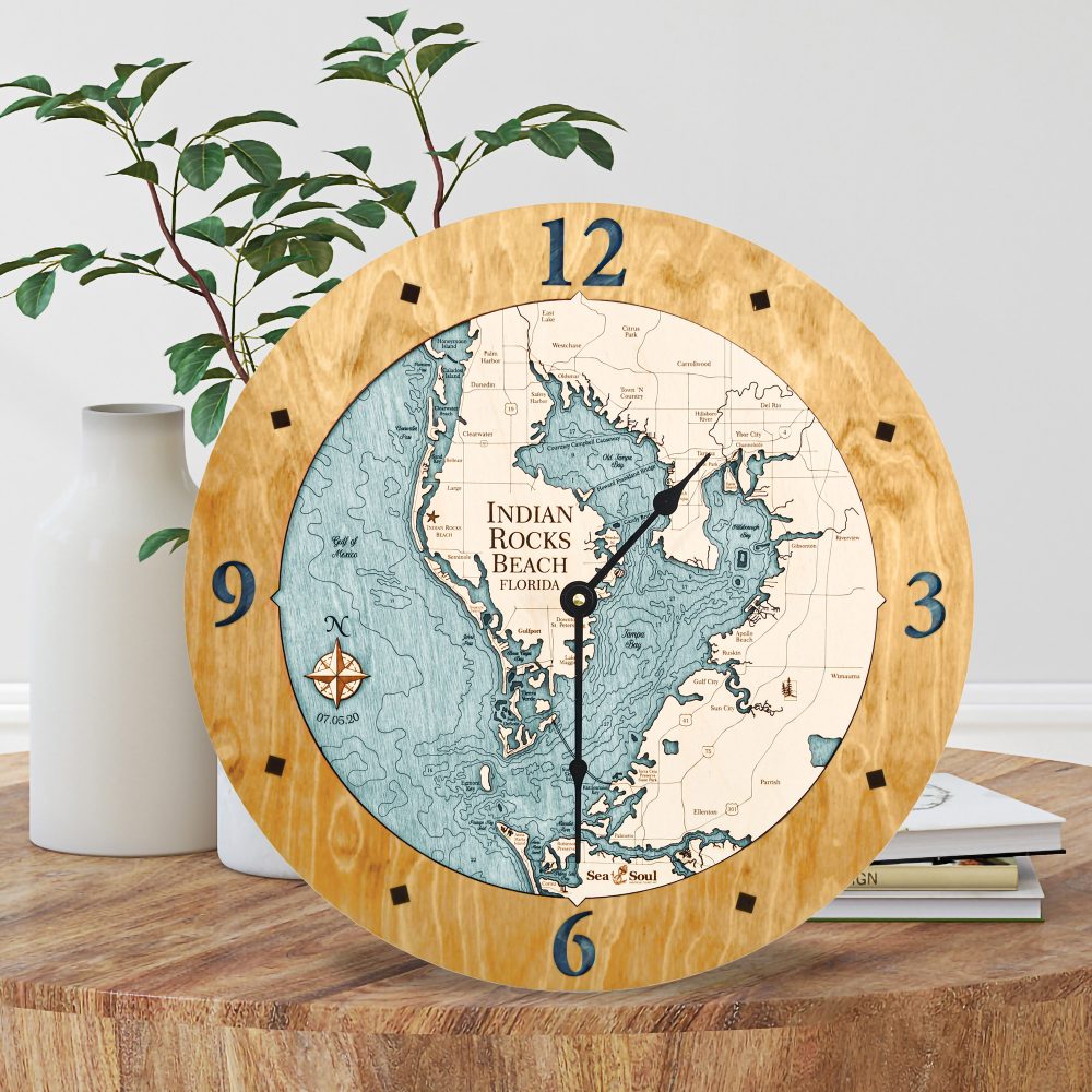 Indian Rocks Beach Nautical Clock Honey Accent with Blue Green Water Sitting on Coffee Table by Books and Vases