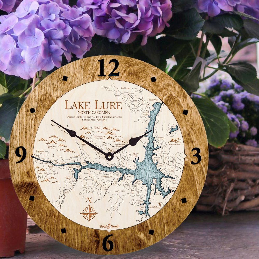 Lake Lure Nautical Map Clock Americana Accent with Blue Green Water Sitting on Ground by Flowers