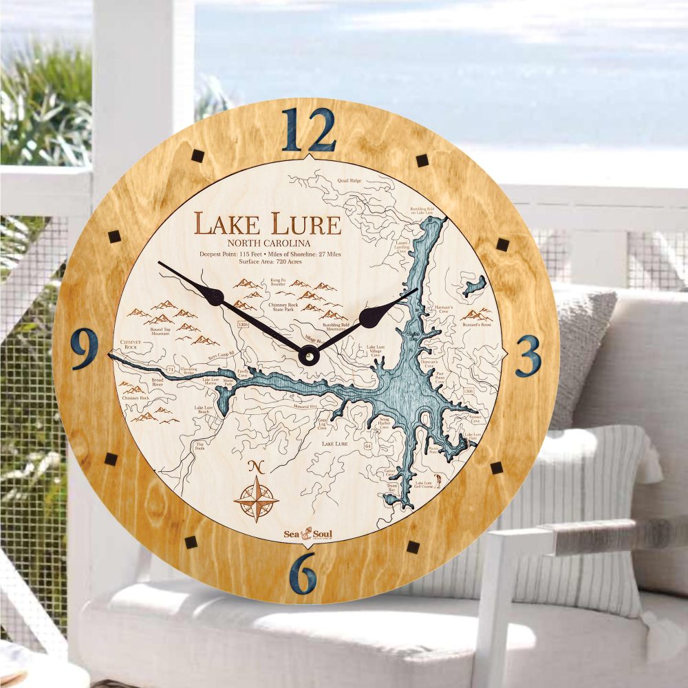 Lake Lure Nautical Clock Honey Accent with Blue Green Water Sitting on Outdoor Chair by Waterfront