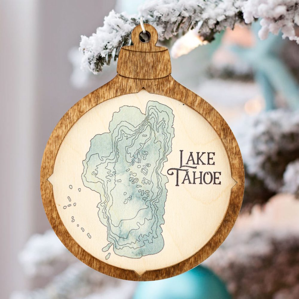 Lake Tahoe Christmas Ornament Americana Accent with Blue Green Water Hanging on Christmas Tree with Snow