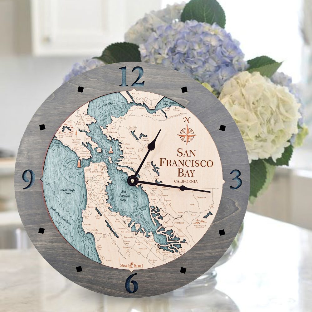 San Francisco Nautical Clock Driftwood Accent with Blue Green Water Sitting on Countertop by Flowers