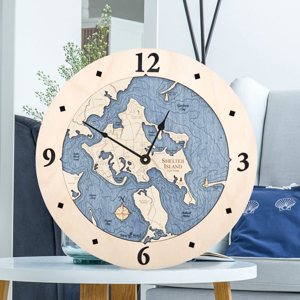 Shelter Island Nautical Clock Birch Accent with Deep Blue Water Sitting on Coffee Table by Armchair