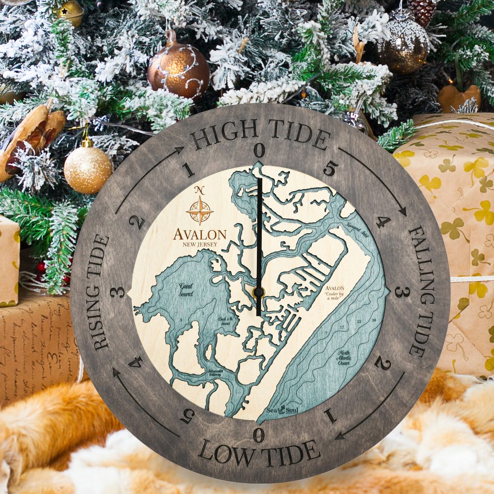 Avalon New Jersey Tide Clock Driftwood Accent with Blue Green Water Sitting on Ground by Christmas Tree and Presents