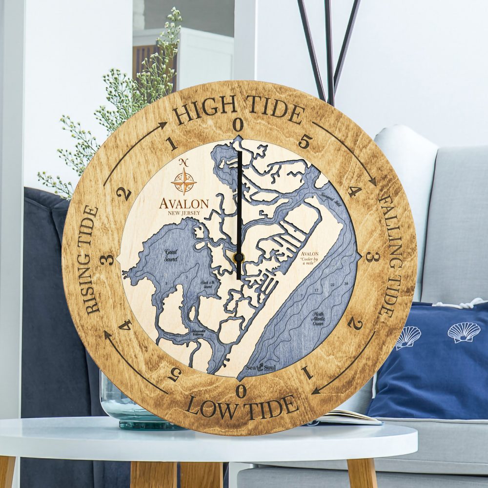 Avalon New Jersey Tide Clock Honey Accent with Deep Blue Water Sitting on Coffee Table by Armchair