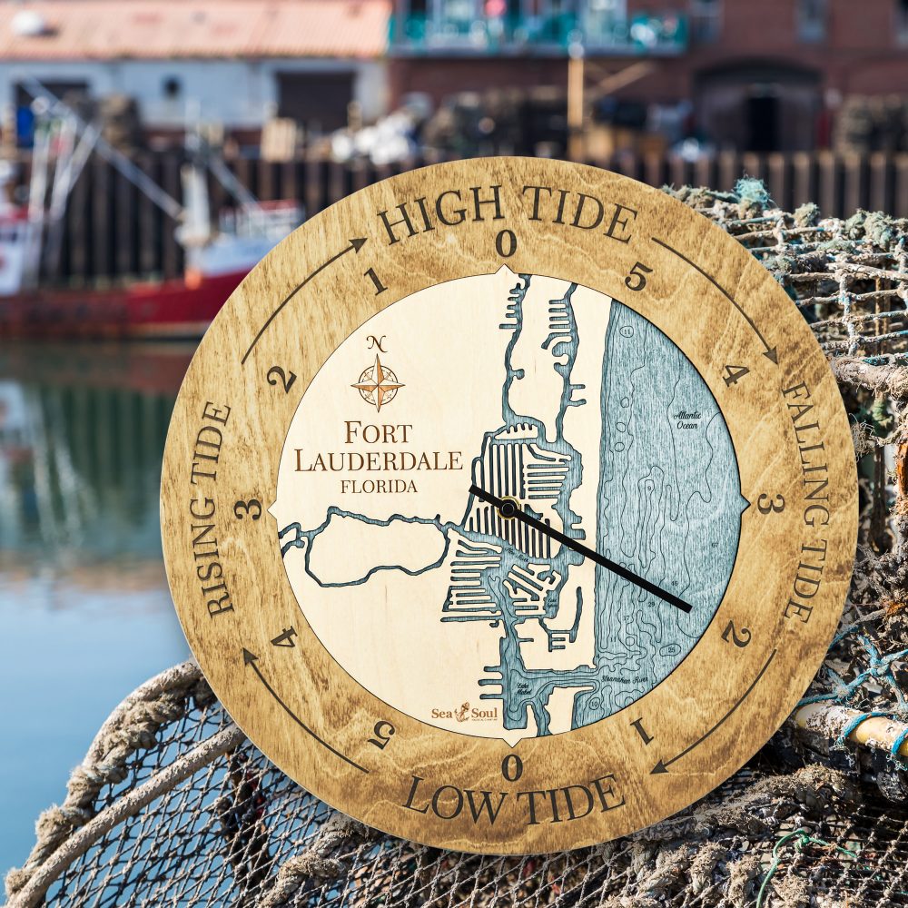 Fort Lauderdale Tide Clock Honey Accent with Blue Green Water Sitting on Fishing Net on Dock