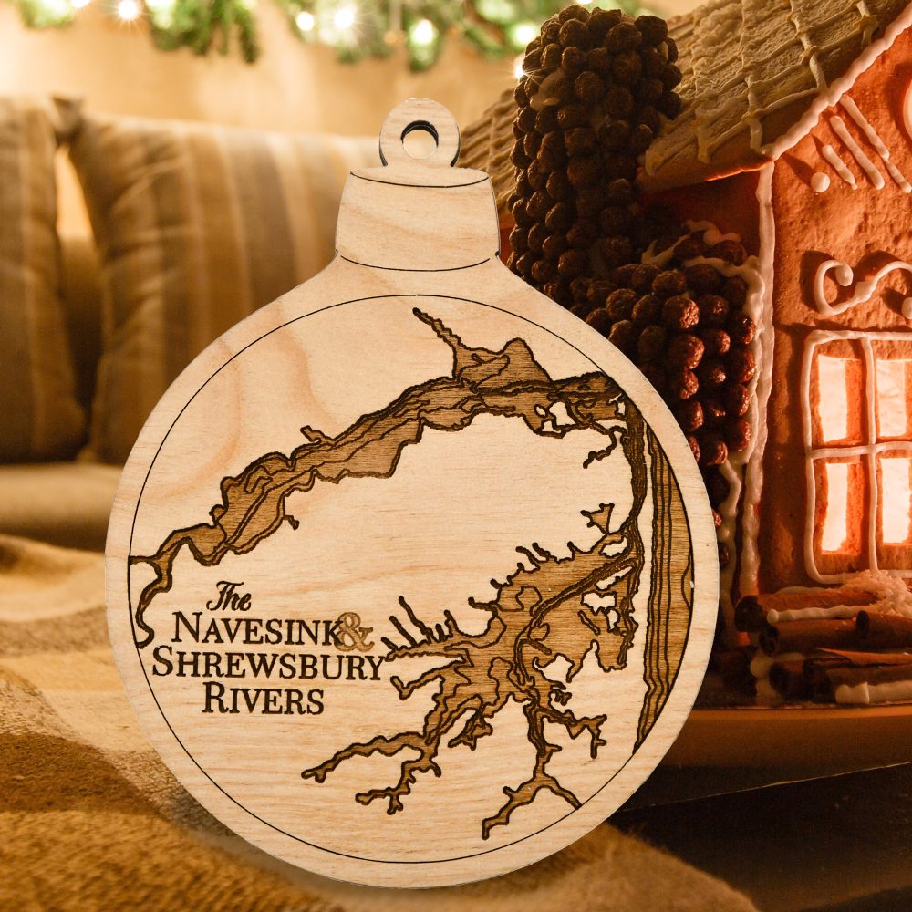 Navesink River Engraved Nautical Ornament Sitting on Table by Gingerbread House