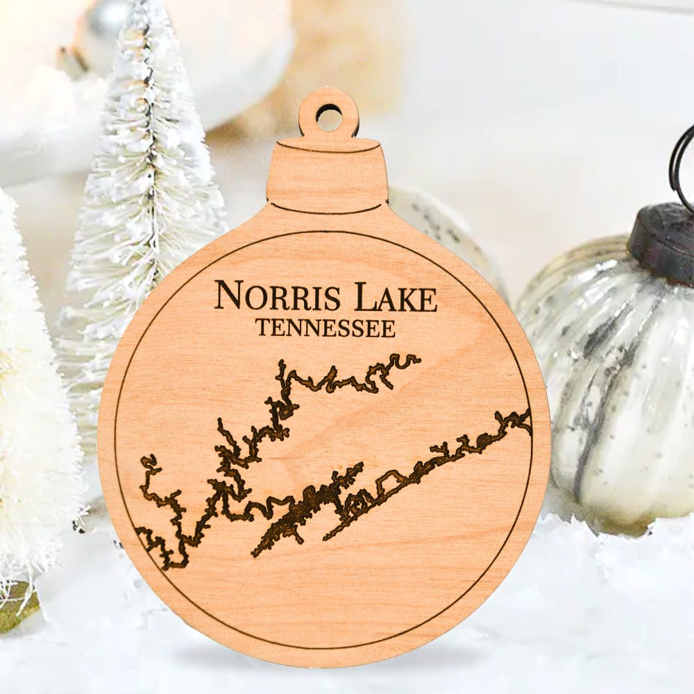 Norris Lake Engraved Nautical Ornament Sitting on Table with Silver Ornaments