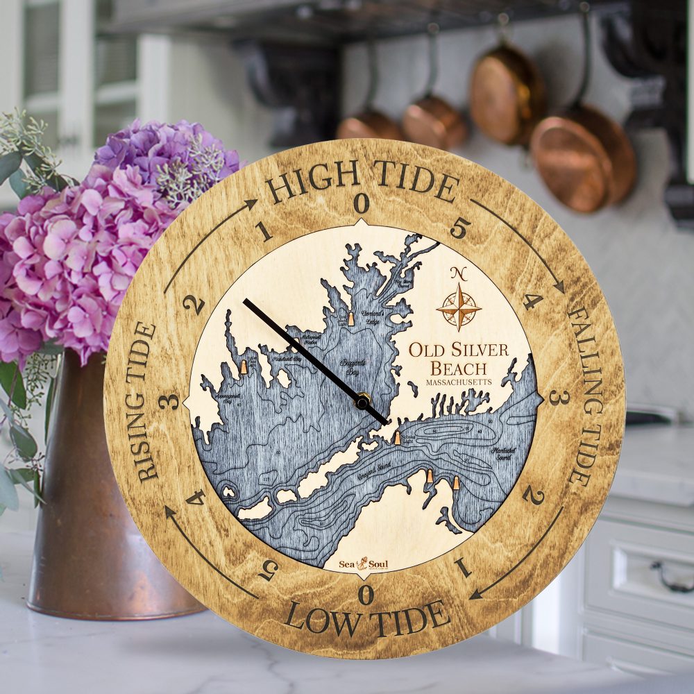 Old Silver Beach Tide Clock Honey Accent with Deep Blue Water Sitting on Countertop with Flowers