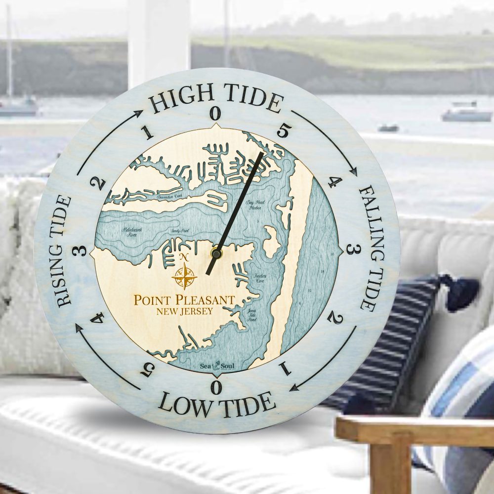 Point Pleasant Tide Clock Bleach Blue Accent with Blue Green Water Sitting on Outdoor Couch by Waterfront
