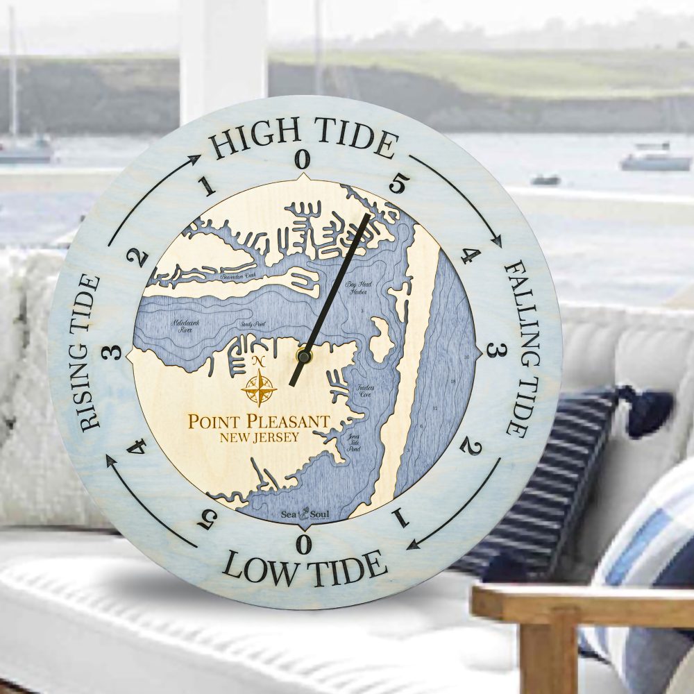 Point Pleasant Tide Clock Bleach Blue Accent with Deep Blue Water Sitting on Outdoor Couch by Waterfront