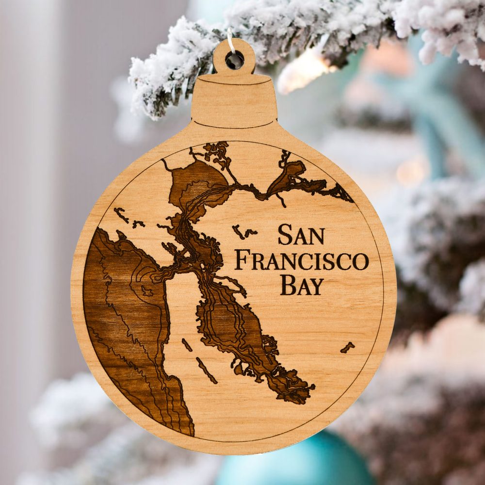 San Francisco Engraved Ornament Hanging on Pine Tree Outdoors with Snow