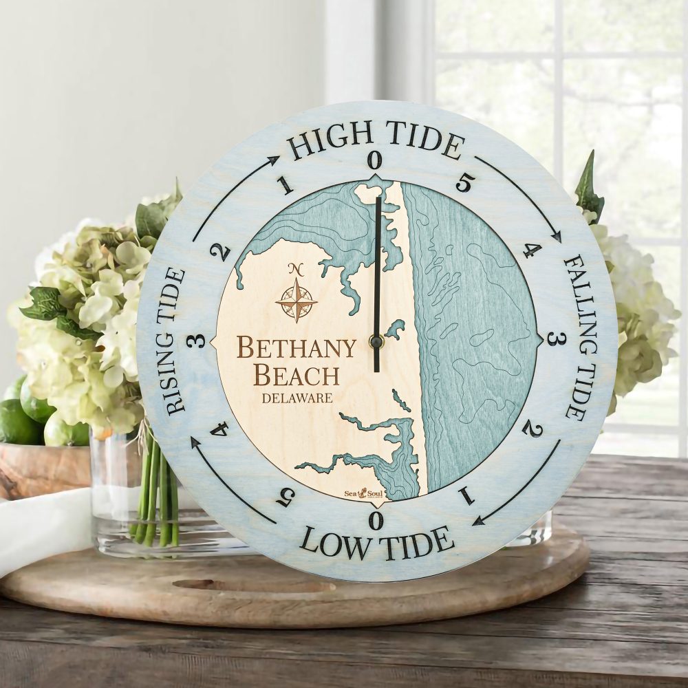 Bethany Beach Tide Clock Bleach Blue Accent with Blue Green Water Sitting on Table with Flowers