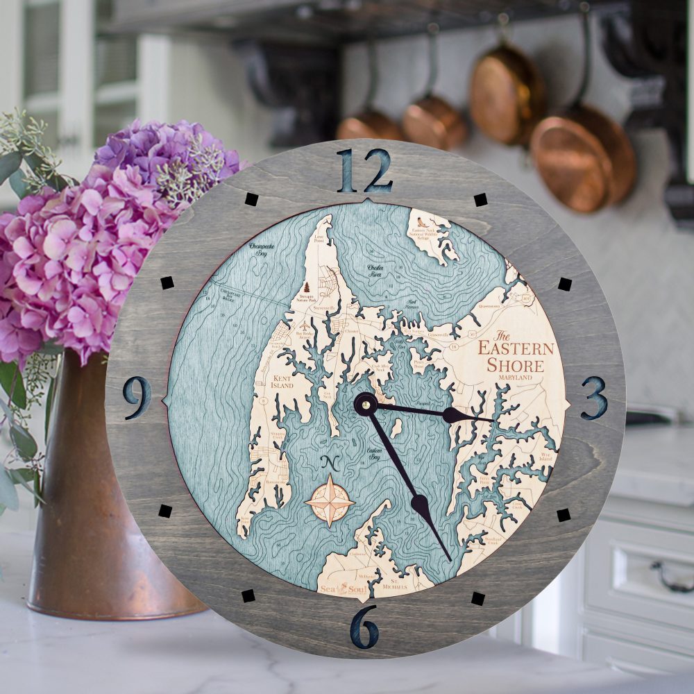Eastern Shore Nautical Map Clock Driftwood Accent with Blue Green Water Sitting on Counter with Flowers