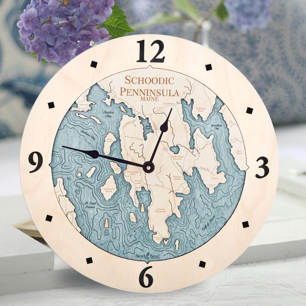 Schoodic Peninsula Nautical Map Clock Birch Accent with Blue Green Water Sitting on Table with Flowers