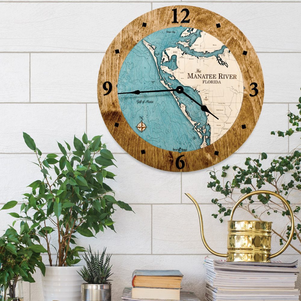 Manatee River Nautical Clock Coffee accent with blue green water in use