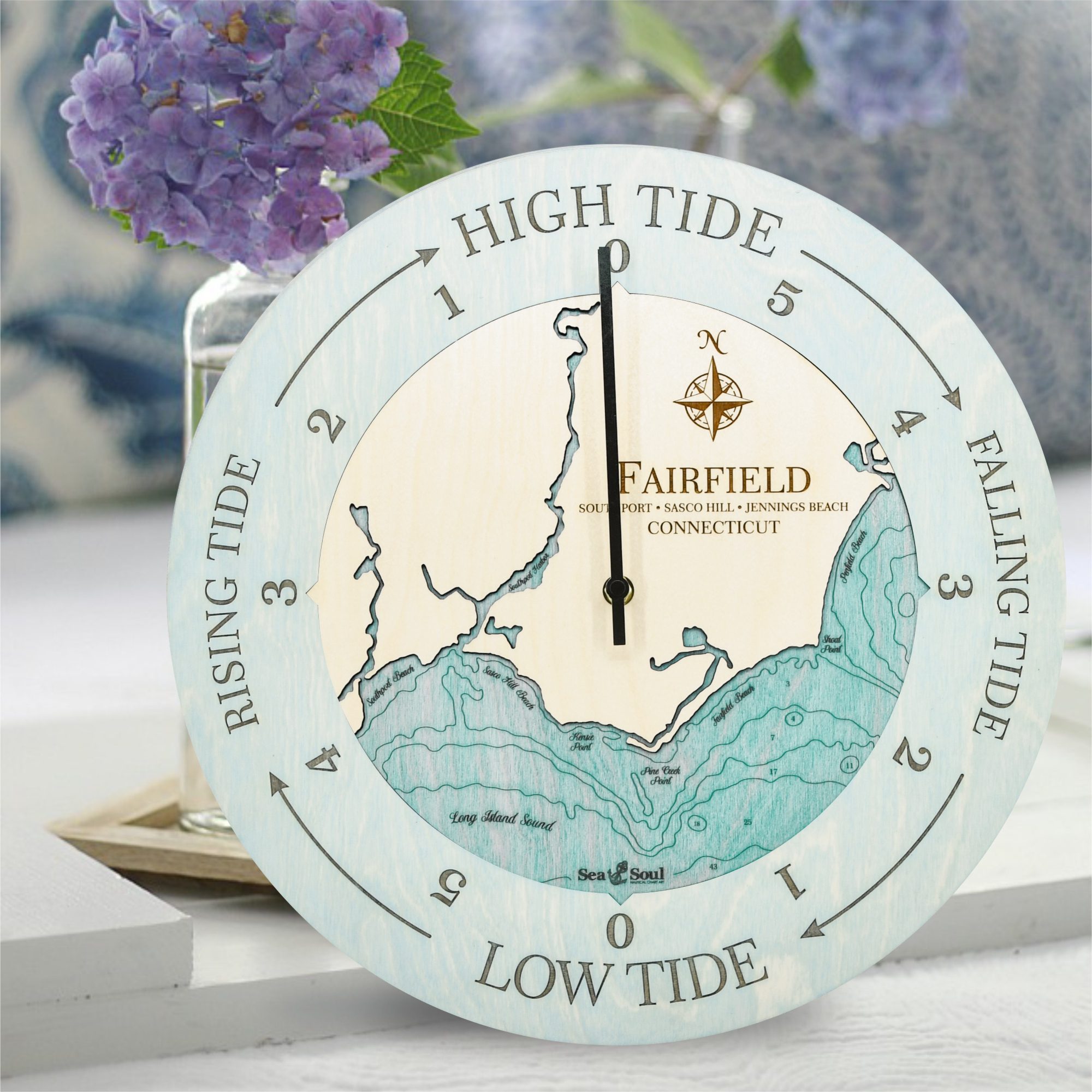 Fairfield Tide Clock in Bleached Blue with Blue Green Water in use