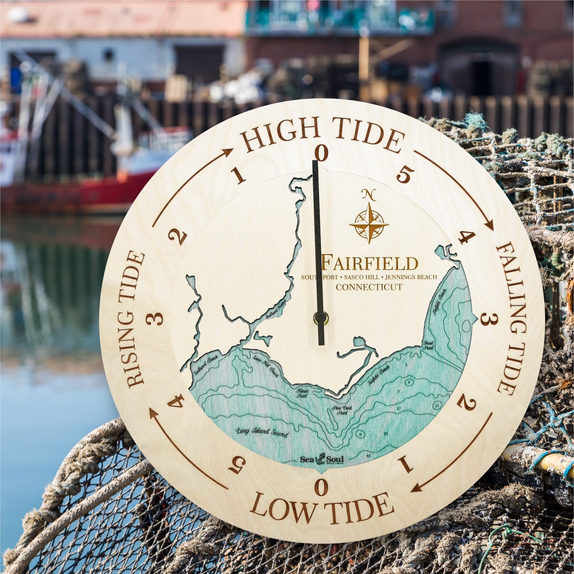 Fairfield Tide Clock in Birch with Blue Green Water in use