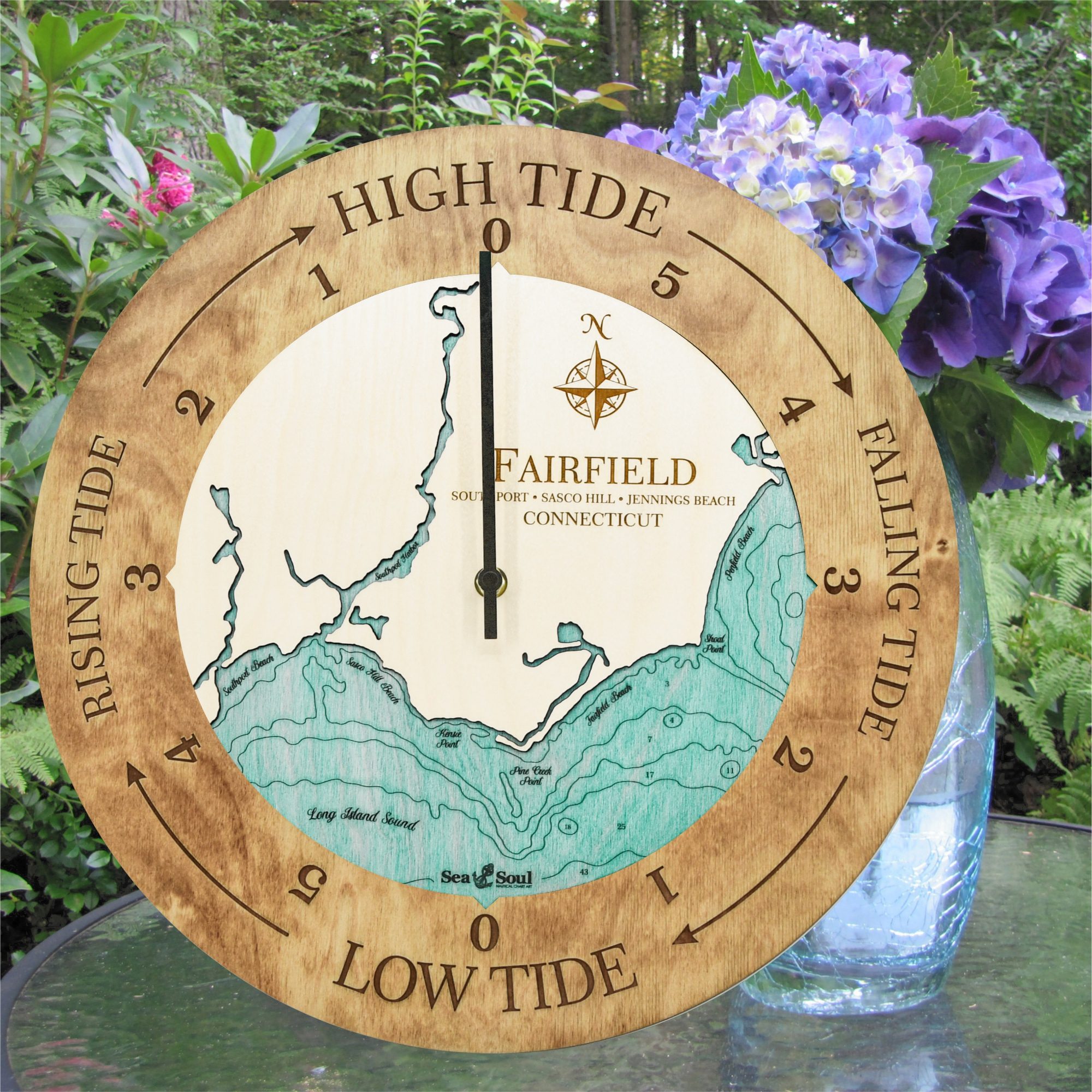 Fairfield Tide Clock in Honey with Blue Green Water in use